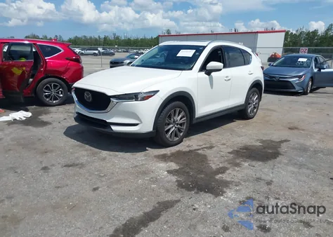2021 Mazda Cx-5 Grand Touring from USA, damaged, VIN JM3KFADM9M0471104